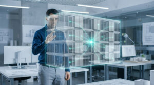 Un architecte interagissant avec une projection holographique 3D d'un bâtiment moderne dans un bureau.